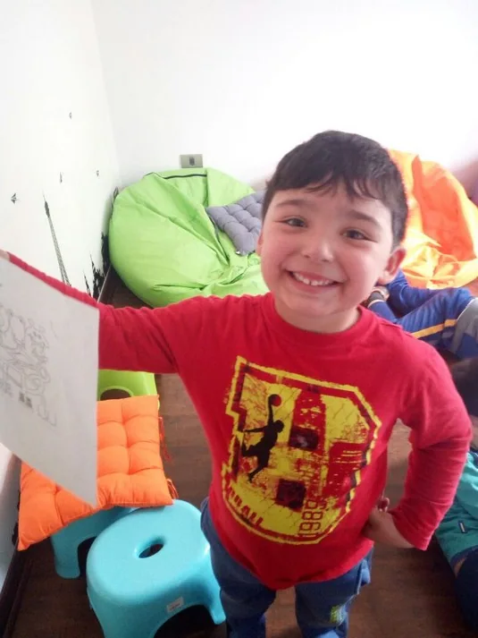 Niño sonriendo durante una actividad de Happy Time After School en La Florida